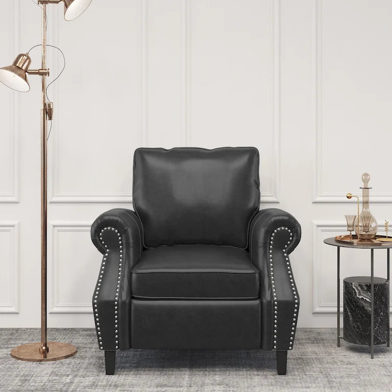 Fauteuil club en similicuir, orné de rivets