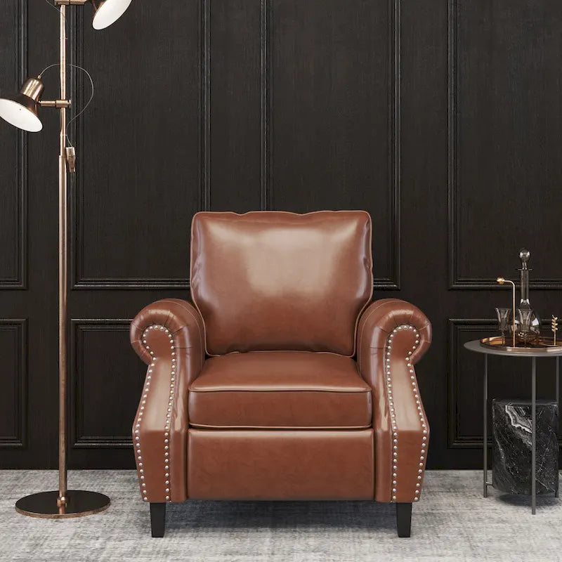Fauteuil club en similicuir, orné de rivets