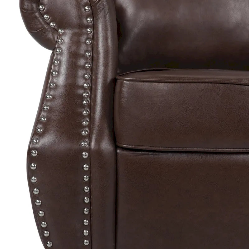 Fauteuil club en similicuir, orné de rivets