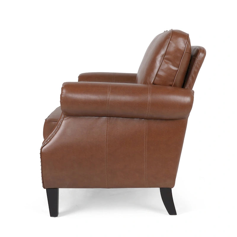 Fauteuil club en similicuir, orné de rivets