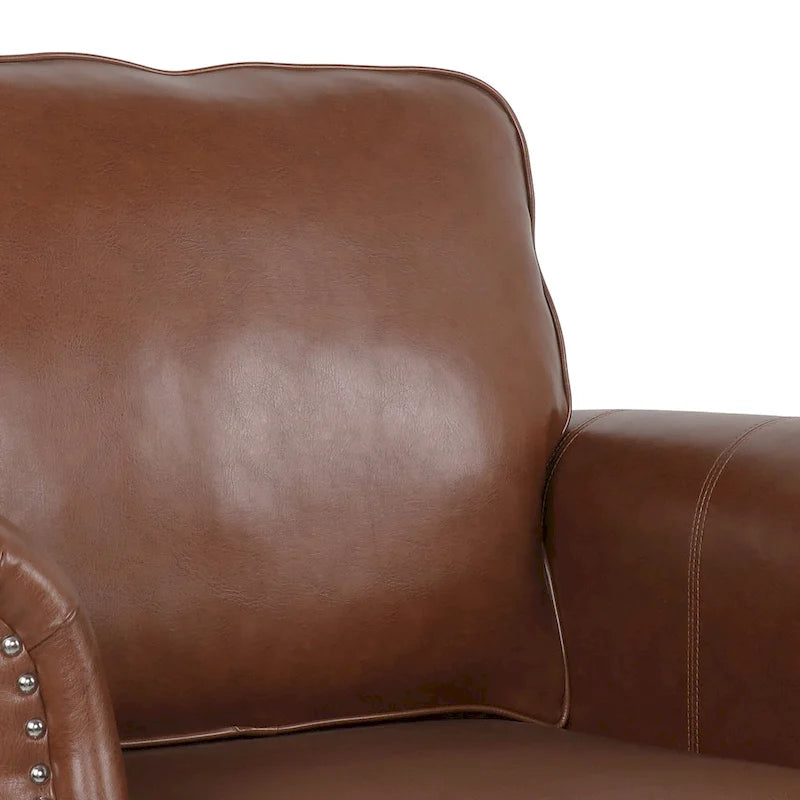 Fauteuil club en similicuir, orné de rivets